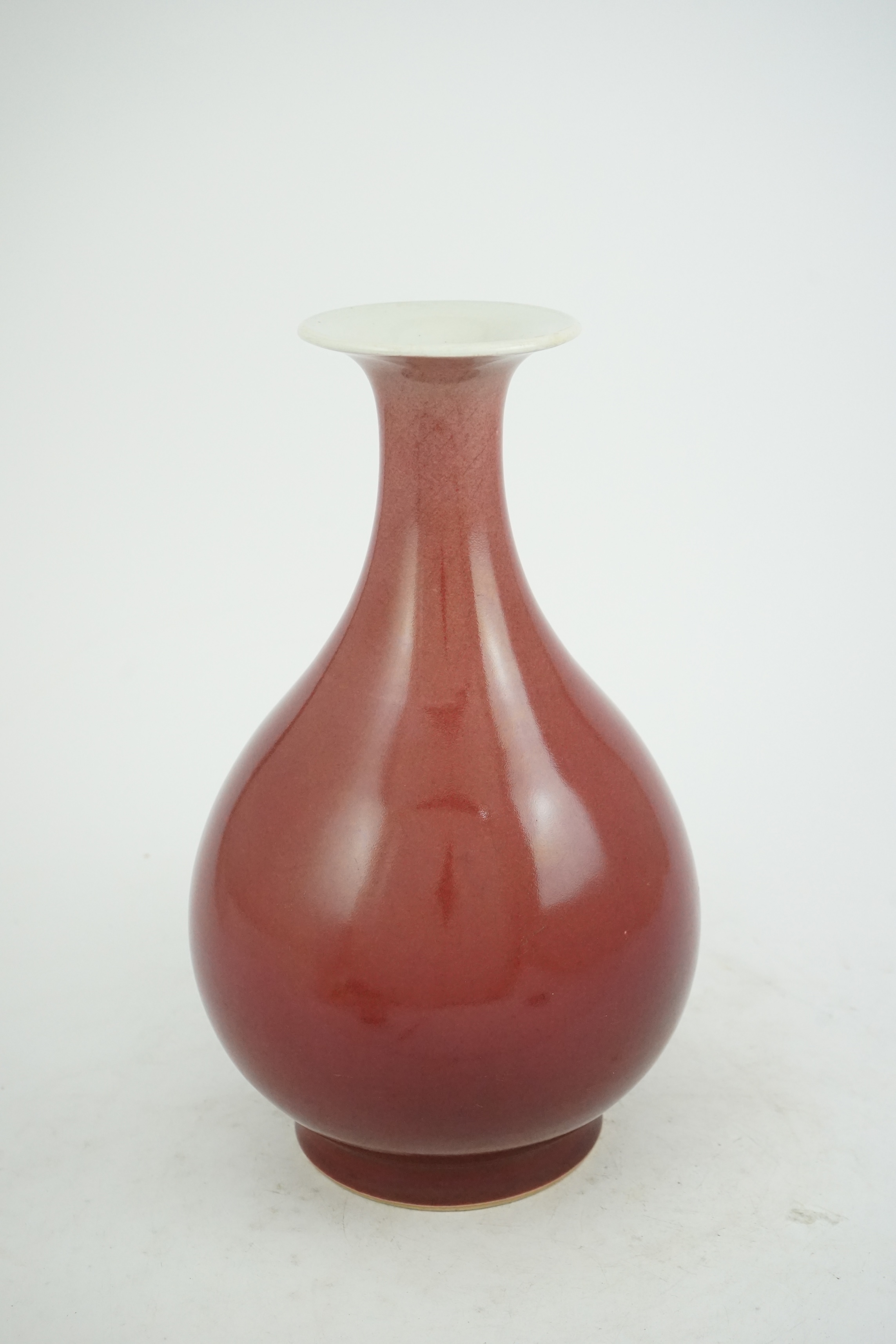 A Chinese sang-de-boeuf glazed pear shaped vase, yuhuchunping, 18th century